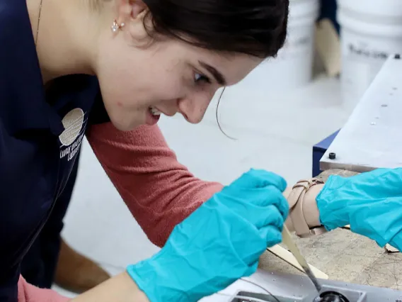 UA optical sciences senior Adriana Mitchell works on CatCam, the camera that will fly on the CatSat satellite. It is likely to be launched in mid-2020 or early 2021.